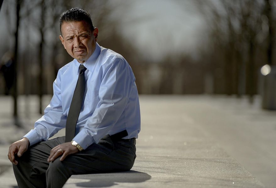 In this Friday, Feb. 14, 2020, photo, Jose Lopez, who was attacked at his Utah tire store, sits outside the federal courthouse in Salt Lake City, where he has testified against the man who yelled, "I'm here to kill a Mexican." A jury has found a Utah man guilty of three hate crimes for shouting that he wanted to “kill Mexicans" before attacking three Latinos at a tire shop. The Salt Lake Tribune reported Wednesday that Alan Dale Covington was convicted of attacking Lopez and his 18-year-old son, Luis, with a 3-foot metal pole in November 2018. (Francisco Kjolseth/The Salt Lake Tribune via AP)