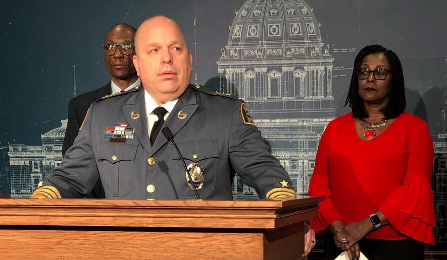 St. Paul Police Chief Todd Axtell speaks at a news conference with lawmakers at the state Capitol in St. Paul, Minn., on Thursday, Feb. 20, 2020, in support of an amendment to to remove a clause allowing slavery and involuntary servitude as punishment for crimes from the state Constitution. Axtell, who had been bothered by the language for some time, made it his new year's resolution to get it deleted. (AP Photo/Steve Karnowski)