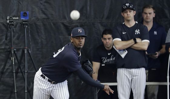 New York Yankees&#39; Luis Severino delivers a pitch in the bullpenn during a spring training baseball workout Thursday, Feb. 13, 2020, in Tampa, Fla. (AP Photo/Frank Franklin II) ** FILE **
