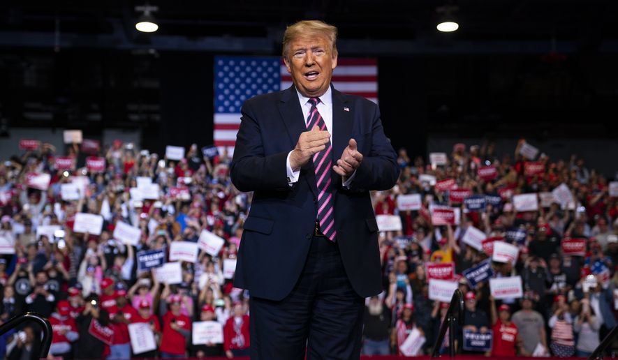 President Donald Trump arrives to speak to a campaign rally at the Las Vegas Convention Center, Friday, Feb. 21, 2020, in Las Vegas. (AP Photo/Evan Vucci)