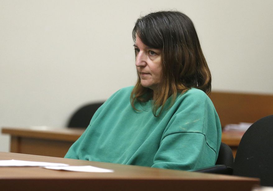 FILE- In this June 2, 2015 file photo, Michelle Lodzinski appears in court for a status conference in New Brunswick, N.J. New Jersey's Supreme Court said Friday, Feb. 21, 2020 that it would hear Lodzinski's appeal for the 1991 murder of her five-year-old son, Timothy Wiltsey. Lodzinski was living in Florida when she was arrested in 2014 and charged with the boy's murder. (Patti Sapone/The Star-Ledger via AP, Pool, File)