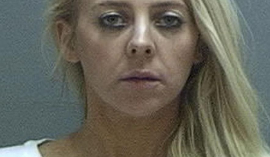 FILE - This undated file photo provided by the Salt Lake County Sheriff's Office shows Chelsea Cook, a former Utah teacher who pleaded guilty Friday, Feb. 21, 2020, to murder charges in the shooting death of her ex-husband's girlfriend, who was killed in front of the former couple's 3-year-old twins. Prosecutors have said Chelsea Cook killed Lisa Williams while she and the children decorated a Christmas tree in 2018. (Salt Lake County Sheriff's Office via AP, File)