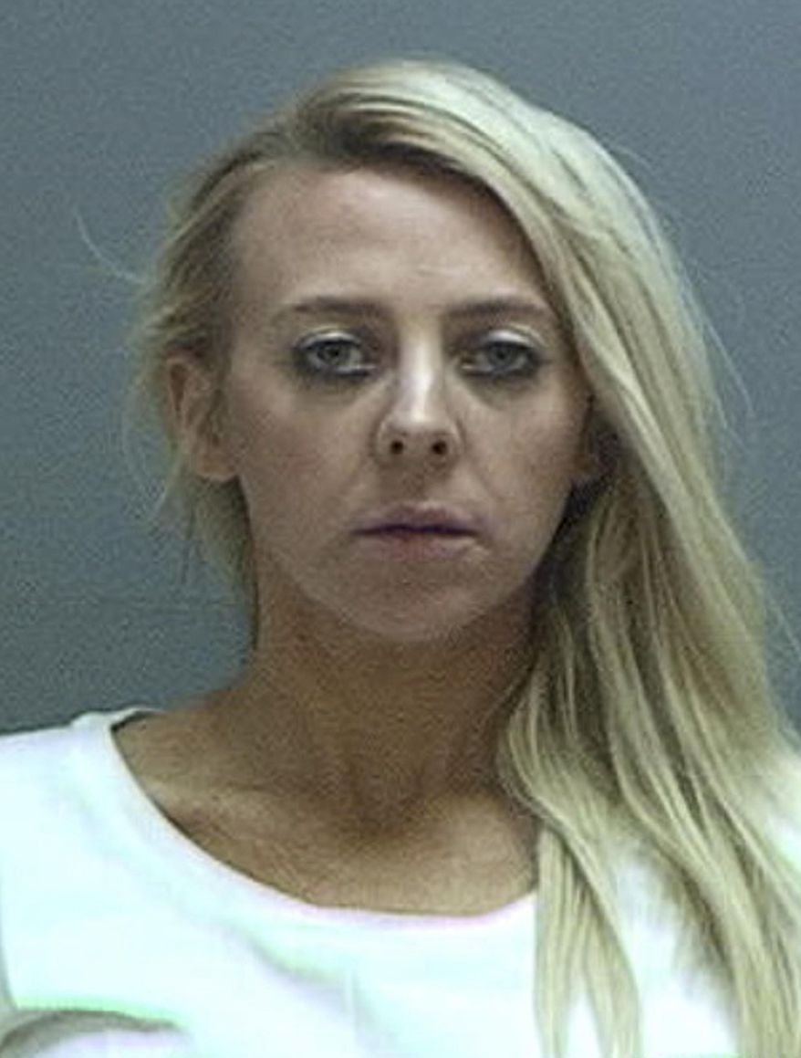 FILE - This undated file photo provided by the Salt Lake County Sheriff's Office shows Chelsea Cook, a former Utah teacher who pleaded guilty Friday, Feb. 21, 2020, to murder charges in the shooting death of her ex-husband's girlfriend, who was killed in front of the former couple's 3-year-old twins. Prosecutors have said Chelsea Cook killed Lisa Williams while she and the children decorated a Christmas tree in 2018. (Salt Lake County Sheriff's Office via AP, File)