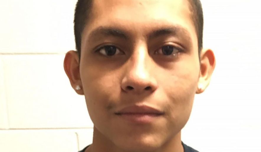 This undated image released by the Montgomery County Police Department, shows Miguel Angel Lopez-Abrego, 19, who is an alleged member of the MS-13 gang involved in the homicide of an unidentified man who was found dead at Wheaton Regional Park in Wheaton, Md. The March 2017 slaying was part of a wave of violence that federal authorities pinned on Maryland-based members of La Mara Salvatrucha street gang, or MS-13 for short. A May 2019 indictment against 22 members and associates of MS-13 "cliques" in Maryland said they were responsible for at least six murders, five attempted murders, a string of assaults, drug trafficking and other crimes. Lopez Abrego, one of those defendants, is scheduled to be sentenced on Friday, Feb. 21, 2020, in Baltimore, in the latest in a flurry of guilty pleas and sentencings in the case. (Montgomery County Police Department, via AP)