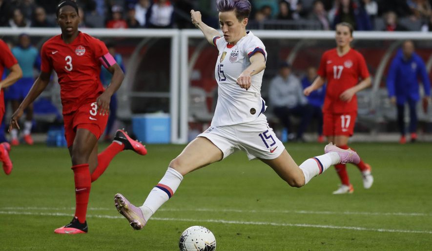 U.S. forward Megan Rapinoe scores against Canada during the second half of a CONCACAF women&#39;s Olympic qualifying soccer match Sunday, Feb. 9, 2020, in Carson, Calif. The U.S. won 3-0. (AP Photo/Chris Carlson)