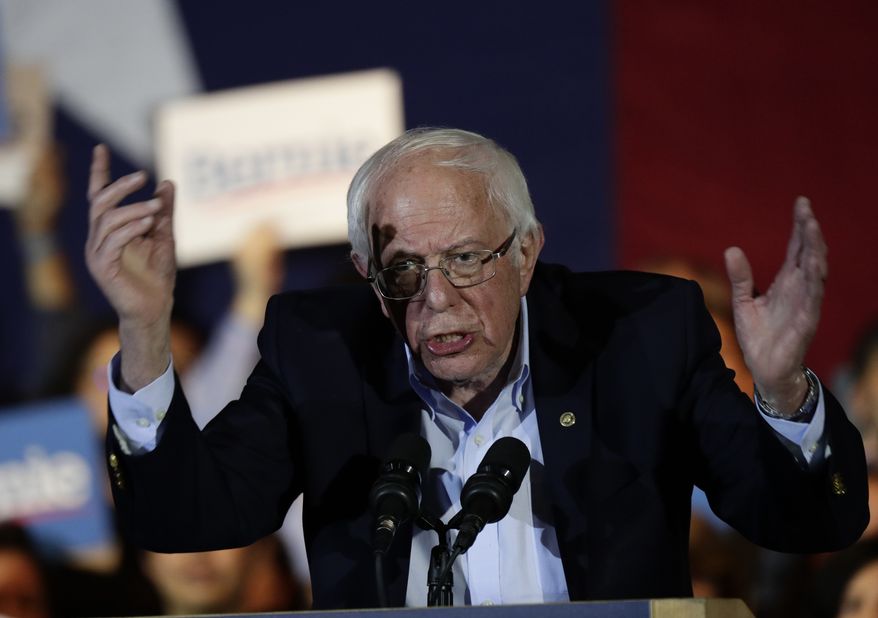 Democratic presidential candidate Sen. Bernie Sanders, I-Vt., right, with his wife Jane, speaks during a campaign event in San Antonio, Saturday, Feb. 22, 2020. (AP Photo/Eric Gay)