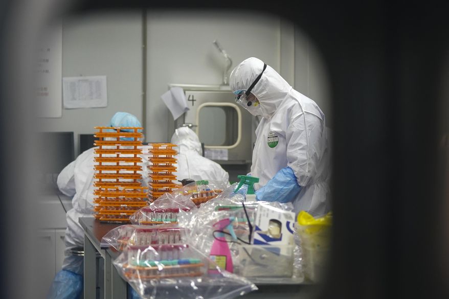 Level two Chinese laboratories have been studying bat coronaviruses similar to the SARS-CoV-2 virus that causes COVID-19. (Associated Press/File)