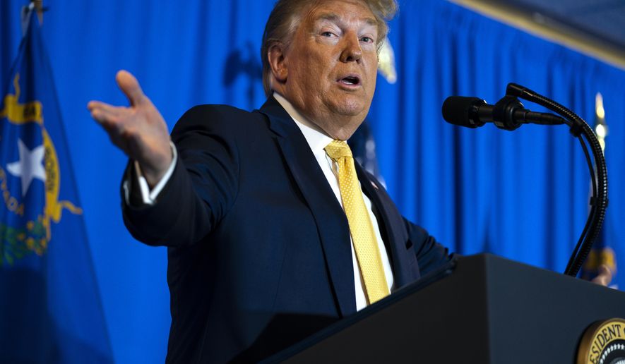 President Donald Trump delivers the commencement address at the "Hope for Prisoners" graduation ceremony, Thursday, Feb. 20, 2020, in Las Vegas. (AP Photo/Evan Vucci)