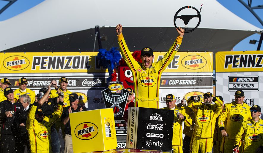 Joey Logano celebrates after winning a NASCAR Cup Series auto race at the Las Vegas Motor Speedway on Sunday, Feb. 23, 2020. (AP Photo/Chase Stevens)