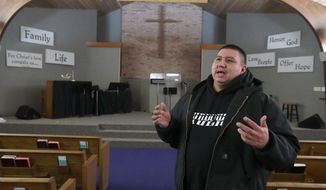 In this Jan. 16, 2020 photo, Billy Keeble talks about how he was moved to participate in services at Family Life Church in Sisseton, S.D., when he came to the church when he hit bottom as an alcoholic. Since becoming sober Keeble is going to college at the Sisseton Wahpeton College and serves as a lay minister at a church in the area. (John Davis/Aberdeen American News via AP(