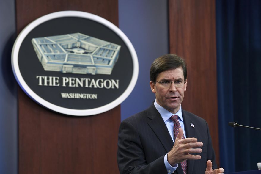 In this Dec. 20, 2019, file photo Defense Secretary Mark Esper speaks during a news conference at the Pentagon in Washington. The Pentagon is adopting new ethical principles as it prepares to accelerate its use of artificial intelligence technology on the battlefield. (AP Photo/Susan Walsh) **FILE**