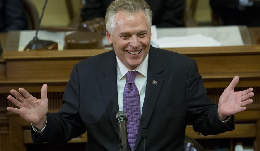 In this Jan. 10, 2018, file photo, Virginia Gov. Terry McAuliffe addresses a joint session of the the 2018 session in the House chambers at the Capitol in Richmond, Va. (AP Photo/Steve Helber, File)