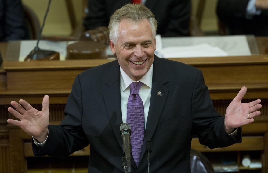 In this Jan. 10, 2018, file photo, Virginia Gov. Terry McAuliffe addresses a joint session of the the 2018 session in the House chambers at the Capitol in Richmond, Va. (AP Photo/Steve Helber, File)