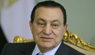 In this April 2, 2008, file photo, Egyptian President Hosni Mubarak looks attends a meeting at the Presidential palace, in Cairo, Egypt. Egypt state TV said Tuesday, Feb. 25, 2020. that the country&#39;s former President Hosni Mubarak, ousted in the 2011 uprising, has died at 91. (AP Photo/Amr Nabil, File)