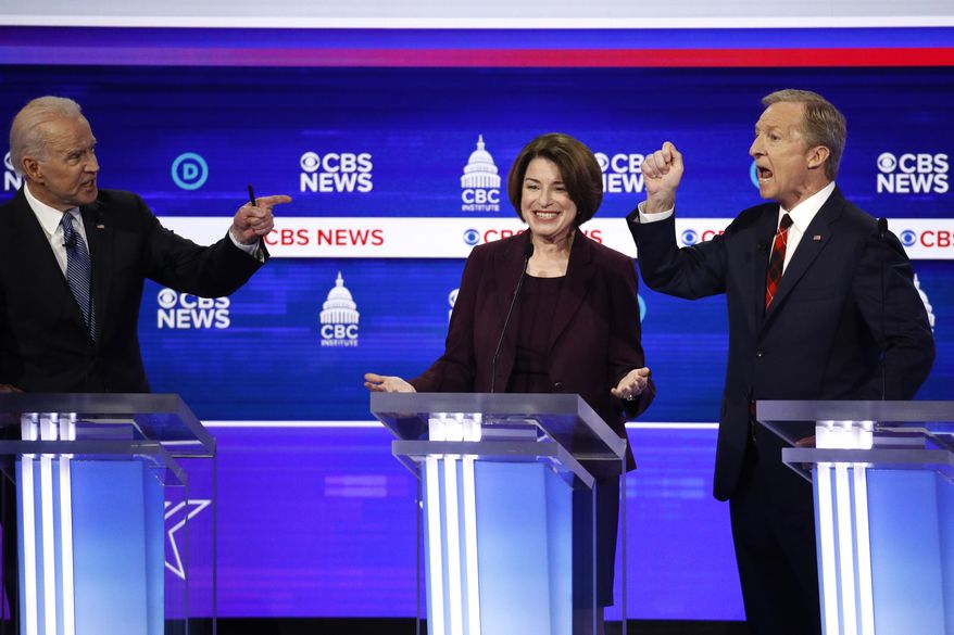 From left, Democratic presidential candidates, former Vice President Joe Biden, Sen. Amy Klobuchar, D-Minn., and businessman Tom Steyer, participate in a Democratic presidential primary debate at the Gaillard Center, Tuesday, Feb. 25, 2020, in Charleston, S.C., co-hosted by CBS News and the Congressional Black Caucus Institute. (AP Photo/Patrick Semansky)