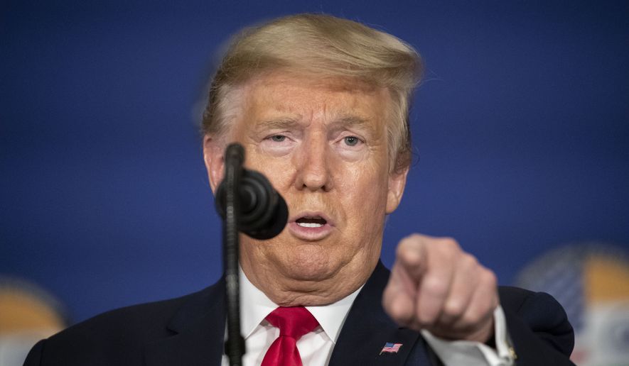 U.S. President Donald Trump points to a question during a news conference, Tuesday, Feb. 25, 2020, in New Delhi, India. (AP Photo/Alex Brandon)