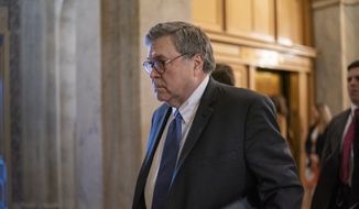 Attorney General William Barr arrives for a meeting with lawmakers on Capitol Hill about expiring intelligence provisions, in Washington, Tuesday, Feb. 25, 2020.  (AP Photo/J. Scott Applewhite)