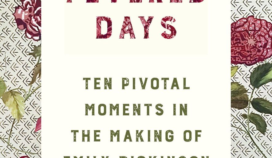 This cover image released by W.W. Norton shows &amp;quot;These Fevered Days: Ten Pivotal Moments in the Making of Emily Dickinson&amp;quot; by Martha Ackmann. (W.W. Norton via AP)