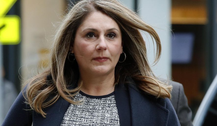 Michelle Janavs arrives at federal court, Tuesday, Feb. 25, 2020, in Boston, for sentencing in a nationwide college admissions bribery scandal. (AP Photo/Elise Amendola)