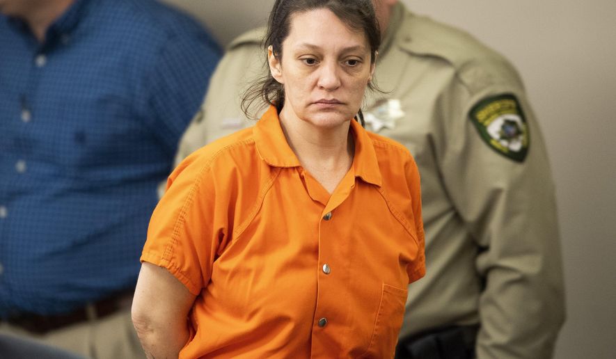 In this Monday, Feb. 24, 2020, photo, Angela Boswell appears in Wilkes County District Court in Wilkesboro, N.C. Boswell is the grandmother of Evelyn Mae Boswell, a 15-month-old Tennessee girl who is the subject of an Amber Alert. The child's grandmother, Angela Boswell, and her boyfriend, William McCloud, were arrested last week in North Carolina on fugitive warrants unrelated to the toddler's disappearance, Wilkes County Sheriff's Lt. Logan Kerr said. (Brianna Paciorka/Knoxville News Sentinel via AP)