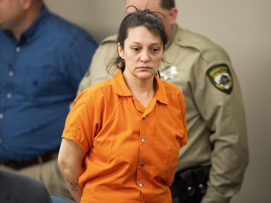 In this Monday, Feb. 24, 2020, photo, Angela Boswell appears in Wilkes County District Court in Wilkesboro, N.C. Boswell is the grandmother of Evelyn Mae Boswell, a 15-month-old Tennessee girl who is the subject of an Amber Alert. The child's grandmother, Angela Boswell, and her boyfriend, William McCloud, were arrested last week in North Carolina on fugitive warrants unrelated to the toddler's disappearance, Wilkes County Sheriff's Lt. Logan Kerr said. (Brianna Paciorka/Knoxville News Sentinel via AP)