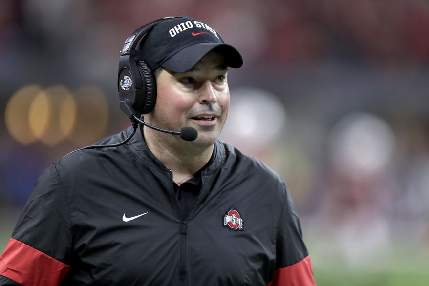 FILE - In this Saturday, Dec. 7, 2019, file photo, Ohio State coach Ryan Day watches during the second half of the team's Big Ten championship NCAA college football game against Wisconsin in Indianapolis. Ryan Day, who led Ohio State to a 13-1 record and a College Football Playoff appearance in his first year as head coach, is being rewarded with a three-year contract extension and a salary bump, the university said Tuesday, Feb. 25, 2020. (AP Photo/Michael Conroy, File)