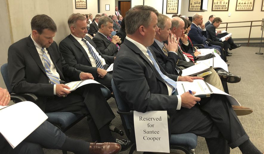 Executives of Santee Cooper listen as the utility makes its presentation before the Senate Finance Committee on Tuesday, Feb. 25, 2020, in Columbia, S.C. Four executives did not show up because their lawyers advised them not to testify. (AP Photo / Jeffrey Collins)