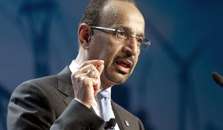 FILE - In this March 5, 2013 file photo, then Saudi Aramco President and CEO Khalid Al-Falih speaks at the IHS CERAWEEK energy conference in Houston, Texas. Saudi Arabia&#39;s monarch Tuesday, Feb. 25, 2020, appointed Al-Falih as the country&#39;s new minister of investment a prominent figure in the kingdom who previously served as energy minister and board chairman of Saudi oil company Aramco before before being relieved of both posts in the run-up to the company&#39;s partial public offering late last year. (AP Photo/Pat Sullivan, File)