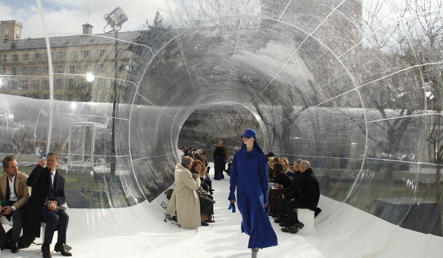 A model wears a creation for the Kenzo fashion collection during Women's fashion week Fall/Winter 2020/21 presented in Paris, Wednesday, Feb. 26, 2020. (AP Photo/Thibault Camus)