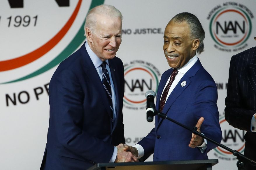 The Rev. Al Sharpton, right, introduces Democratic presidential candidate former Vice President Joe Biden at the National Action Network South Carolina Ministers&#x27; Breakfast, Wednesday, Feb. 26, 2020, in North Charleston, S.C. (AP Photo/Matt Rourke) **FILE**