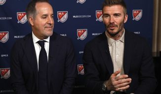 Inter Miami CF co-owners Jorge Mas, left, and David Beckham, are interviewed during the Major League Soccer 25th Season kickoff event, in New York, Wednesday, Feb. 26, 2020. (AP Photo/Richard Drew)