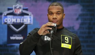 Ohio State running back J. K. Dobbins speaks during a press conference at the NFL football scouting combine in Indianapolis, Wednesday, Feb. 26, 2020. (AP Photo/Michael Conroy)