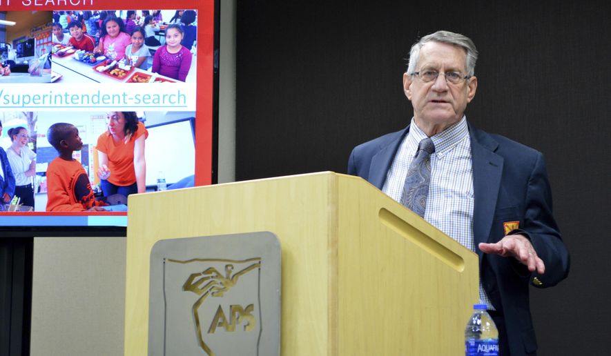 Albuquerque Public Schools board president David Peercy talks to reporters Wednesday, Feb. 26, 2020, in Albuquerque, N.M., after announcing that 39 people have applied to became the district's next school chief. Albuquerque Public Schools, one of the nation's largest school districts, unveiled the names of the 39 applicants and district officials said they hope to have a new superintendent by July. (AP Photo/Russell Contreras)