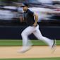 New York Yankees&#39; Giancarlo Stanton runs during a spring training baseball workout Thursday, Feb. 20, 2020, in Tampa, Fla. (AP Photo/Frank Franklin II)