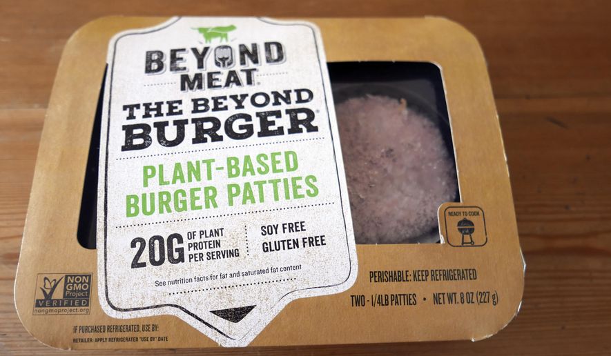 In this June 26, 2019, file photo, a package of meatless burgers are seen in Orlando, Fla. Beyond Meat reports earnings Thursday, Feb. 27. (AP Photo/John Raoux, File) **FILE**