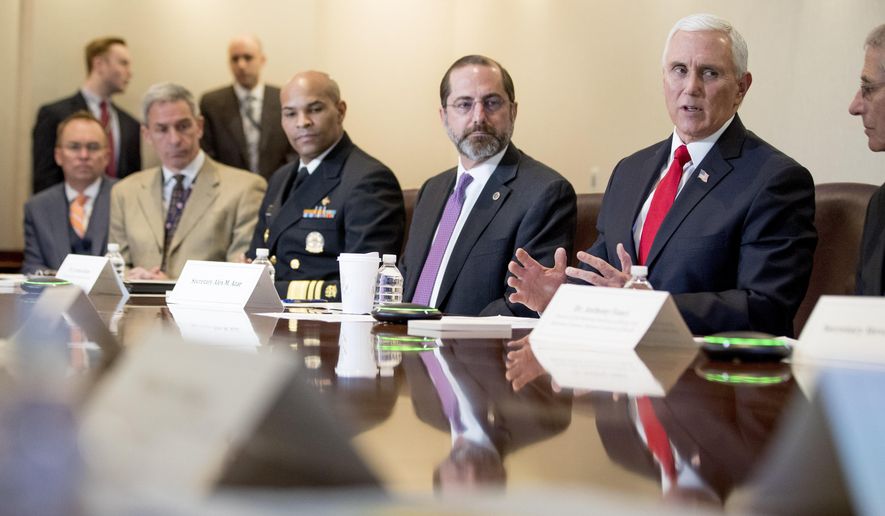 Vice President Mike Pence, accompanied by left, President Donald Trump&#39;s acting Chief of Staff Mick Mulvaney, acting Deputy Secretary of Homeland Security Ken Cuccinelli, Surgeon General Jerome Adams, Health and Human Services Secretary Alex Azar and National Institute for Allergy and Infectious Diseases Director Dr. Anthony Fauci, speaks at a coronavirus task force meeting at the Department of Health and Human Services, Thursday, Feb. 27, 2020, in Washington. (AP Photo/Andrew Harnik)