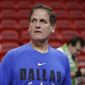 Dallas Mavericks owner Mark Cuban watches players warm up before the start of an NBA basketball game against the Miami Heat, Friday, Feb. 28, 2020, in Miami. (AP Photo/Wilfredo Lee) ** FILE **