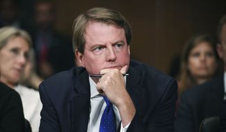 In this Sept. 27, 2018, file photo, then-White House Counsel Don McGahn listens as Supreme court nominee Brett Kavanaugh testifies before the Senate Judiciary Committee on Capitol Hill in Washington. (Saul Loeb/Pool Photo via AP, File)