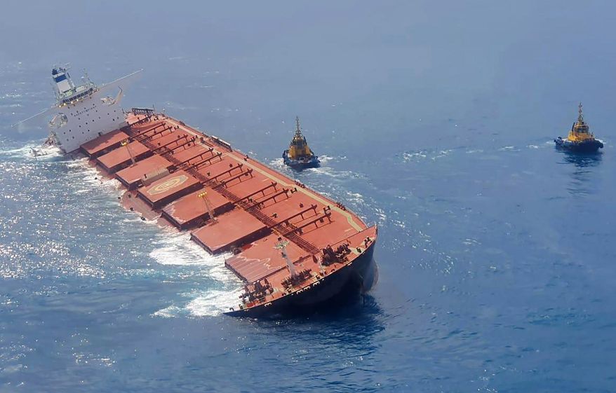 This Feb. 27, 2020 photo released by the Brazilian Navy shows cargo ship Stellar Banner partially emerged offshore of Sao Luis in Maranhao state, Brazil. The cargo ship grounded off the coast of Brazil has begun leaking oil, the country's environmental enforcement agency said Friday. (Brazilian Navy via AP)