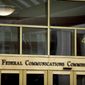 This June 19, 2015, file photo, shows the Federal Communications Commission building in Washington. (AP Photo/Andrew Harnik, File)