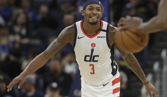 Washington Wizards guard Bradley Beal (3) waits as the Golden State Warriors bring the ball down the court during the first half of an NBA basketball game in San Francisco, Sunday, March 1, 2020. (AP Photo/Jeff Chiu)