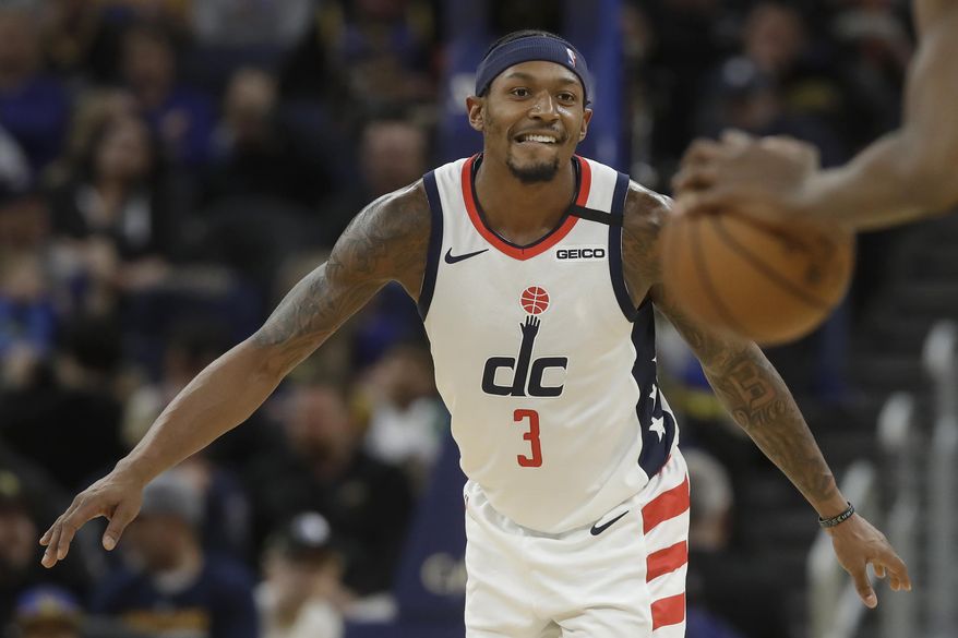 Washington Wizards guard Bradley Beal (3) waits as the Golden State Warriors bring the ball down the court during the first half of an NBA basketball game in San Francisco, Sunday, March 1, 2020. (AP Photo/Jeff Chiu)