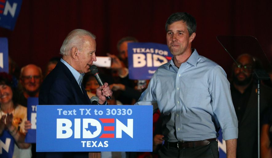 Former Texas Rep. Beto O&#39;Rourke endorses Democratic presidential candidate former Vice President Joe Biden at a campaign rally Monday, March 2, 2020 in Dallas. (AP Photo/Richard W. Rodriguez)