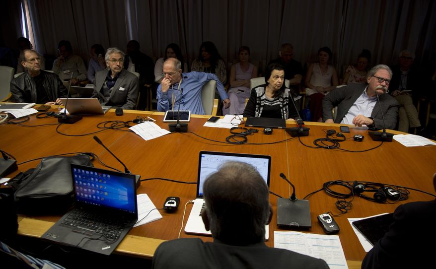 Cuban and foreign scientists and health professionals meet in Havana, Cuba, Monday, March 2, 2020 to evaluate the possibility that pesticides were responsible for symptoms, such as hearing loss and headaches, suffered by U.S. and Canadian diplomats two years ago. From left are Mark Cohen from UCLA's psychology department, Robert Bartholomew an American medical sociologist, Alon Friedman from Dalhousie University’s medical school, Beatrice Golomb from California University’s medical school, and Mark M. Rasenick from University of Illinois medical school. (AP Photo/Ismael Francisco)