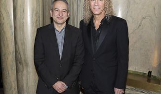 FILE - This Jan. 30, 2020 file photo shows playwright Joe DiPietro, left, and David Bryan participate in a &amp;quot;Diana&amp;quot; Broadway musical cast special performance in New York. Bryan, the keyboardist for Bon Jovi is embarking on a busy 2020, with a new album and tour with one of America&#x27;s favorite rock bands as well as opening his second Broadway musical, “Diana. (Photo by Greg Allen/Invision/AP, File)