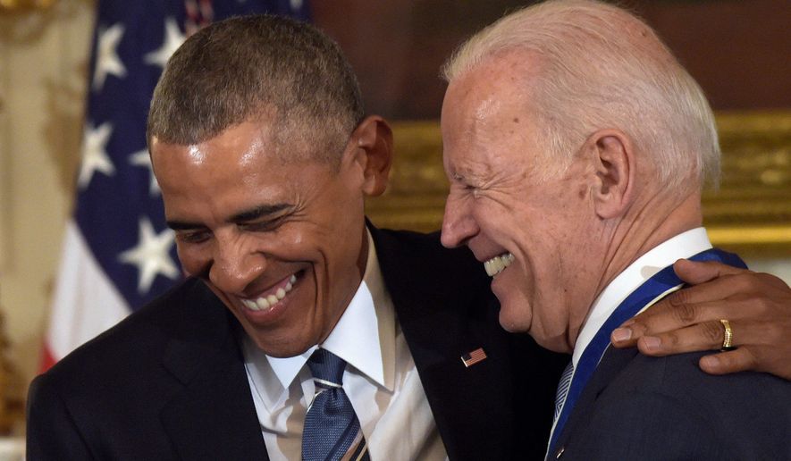 Former president Barack Obama and formver vice president Joe Biden are shown in this undated photo. Mr. Obama is expected to soon formally endorse Mr. Biden, according to a report April 14, 2020. (Associated Press) **FILE**