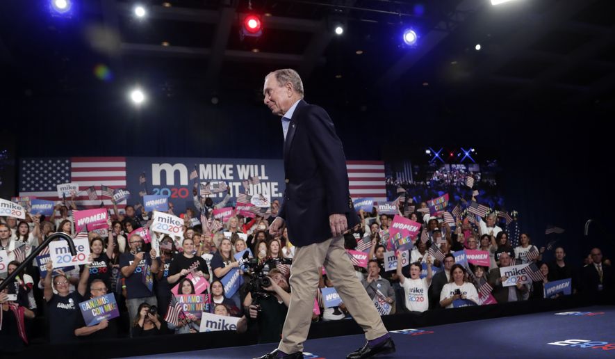 Democratic presidential candidate former New York City Mayor Mike Bloomberg walks off stage after speaking during a rally, Tuesday, March 3, 2020, in West Palm Beach, Fla. (AP Photo/Lynne Sladky)