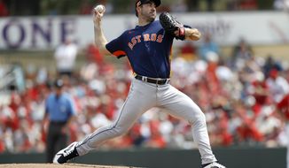 Houston Astros pitcher Justin Verlander throws a pitch during the first inning of a spring training baseball game against the St. Louis Cardinals, Tuesday, March 3, 2020, in Jupiter, Fla. (AP Photo/Julio Cortez)