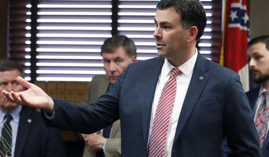 Secretary of State Michael Watson discusses proposed legislation dealing with voters' proof of U.S. citizenship, during a meeting of the Senate Accountability, Efficiency and Transparency Committee at the Capitol in Jackson, Miss., Tuesday, March 3, 2020. (AP Photo/Rogelio V. Solis)