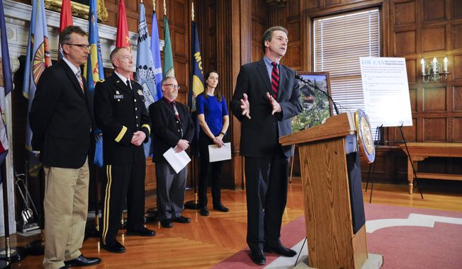Montana Gov. Steve Bullock announces the formation of a coronavirus task force Tuesday, March 3, 2020 at the state Capitol in Helena.  (Thom Bridge/Independent Record via AP)